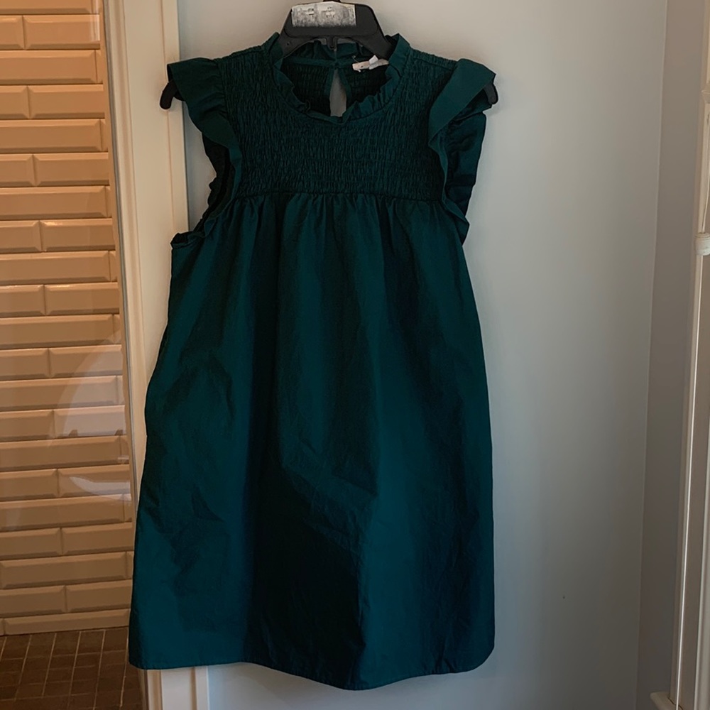 Emerald green smocked sleeveless dress